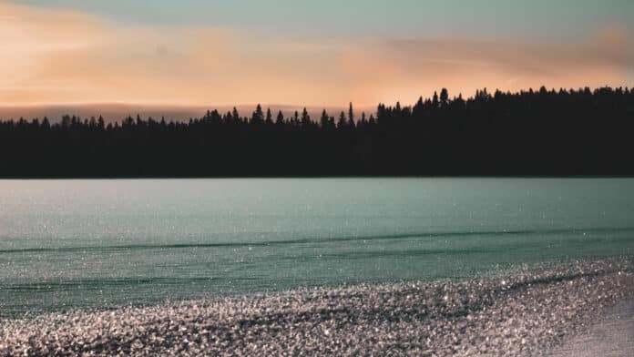 Twilight over frozen lake.