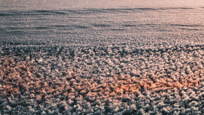 Frost Pattern On Frozen Lake