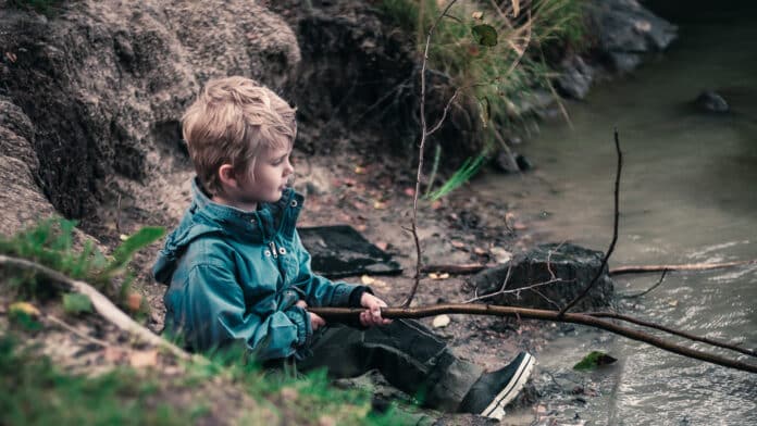 Jack playing with a stick.