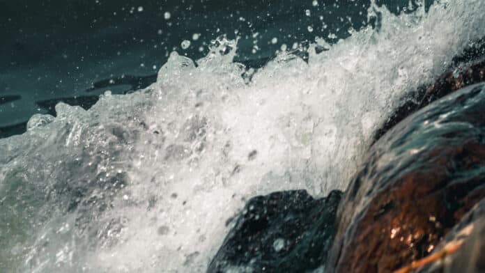 Water splash on wet rock.